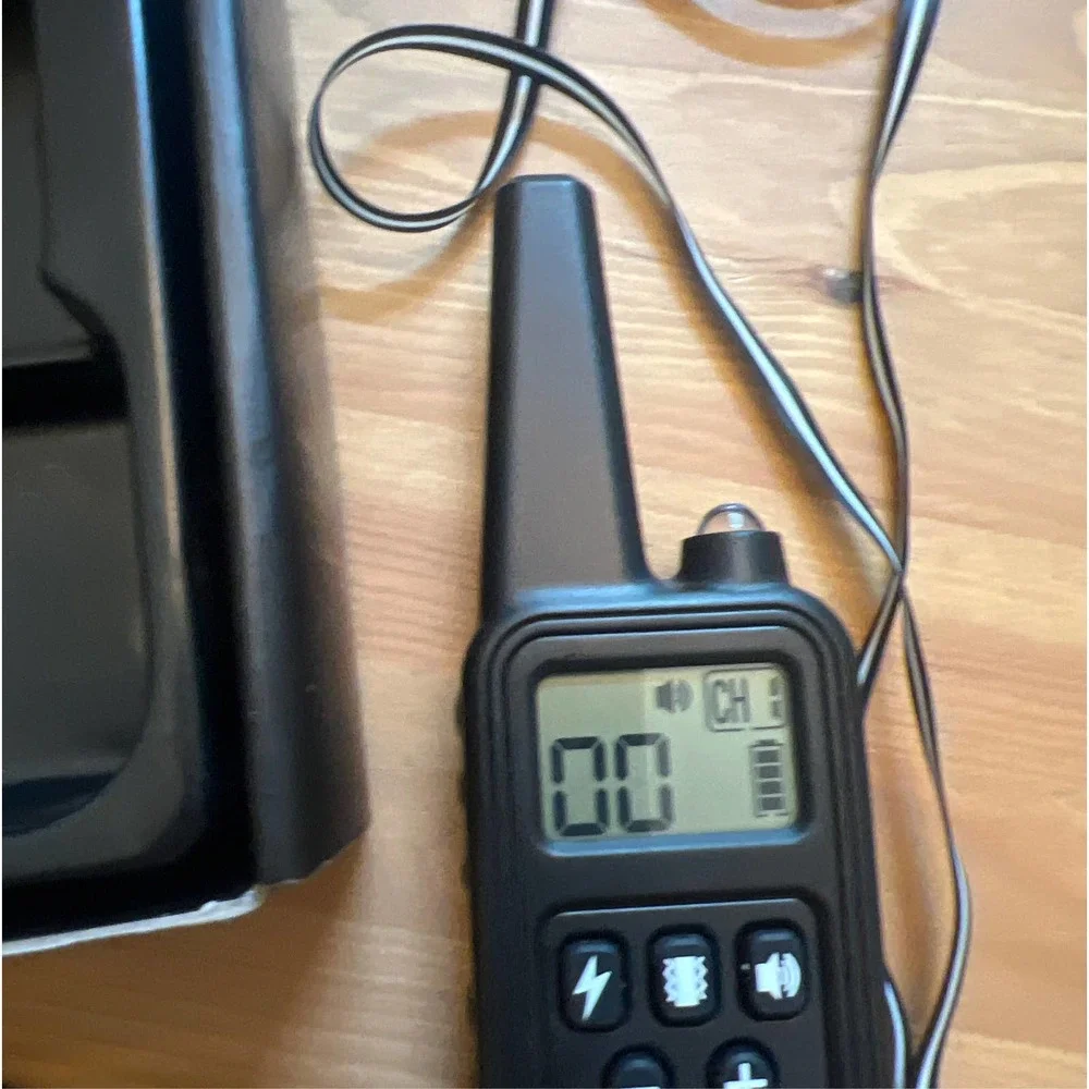 Dog obedience collar shock vibration sound shock turn off button.